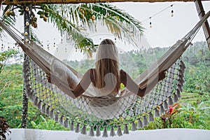 Healthy sleep in the open air at hammock. woman relaxing