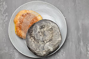 healthy small bread with carob and spices on dish