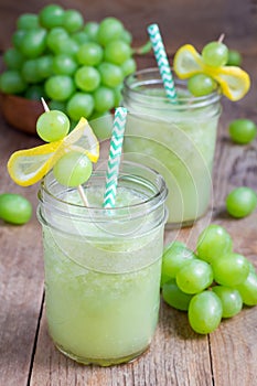 Healthy smoothie with green grape, lemon and honey