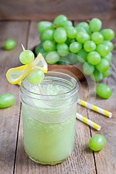 Healthy smoothie with green grape, lemon and honey