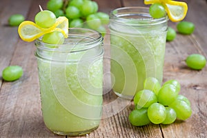 Healthy smoothie with green grape, lemon and honey, horizontal