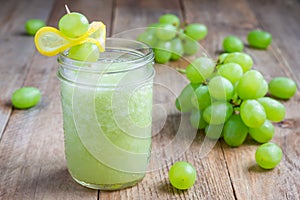 Healthy smoothie with green grape, lemon and honey, horizontal
