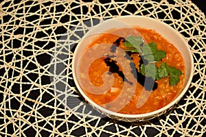 Healthy snack - Dense Lentil soup with tomatoes and carrot