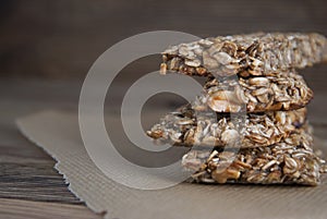 Healthy snack. Fitness. Dietary food. Cereal granola bars with nuts, honey and oat meal. Isolated. Copy space