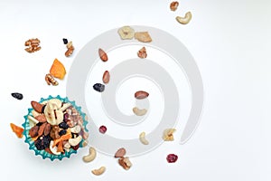 Healthy snack food trail mix of mixed nuts and dried fruits