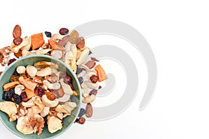 Healthy snack food trail mix of mixed nuts and dried fruits