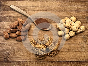 Healthy snacks and cinnamon powder on the wooden cutter board background