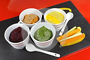 Healthy snacks - four colorful vegetable mousses