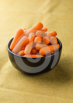 Healthy snacks for workplace lunch: baby carrots. Vegetarian healthy food for office job meal