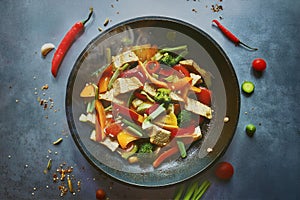 Healthy Stir Fry: Fresh vegetables and meat sizzle in a frying pan, creating a delicious dinner option packed with flavor and