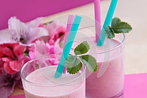 Healthy strawberry smoothie. Fresh milkshake prepared as fruity milk cocktail.