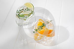 Healthy summer cocktails, mocktails. Set of different citrus lemonades mojitos, with lime, orange, diet detox drinks