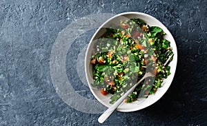 Healthy summer tabule salad bowl top view copy space photo