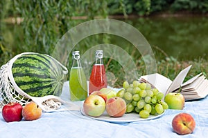 healthy summer vacation picnic with watermelon, delicious fruits