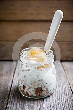 Healthy and tasty breakfast with muesli, yougurt and grilled pears