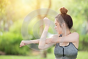 Healthy teen arm stretching sport outdoor exercise warm up