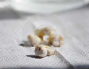 Healthy teeth and cavity tooth on white dentist background