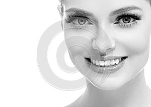 Healthy teeth smile woman beautiful face close up monochrome