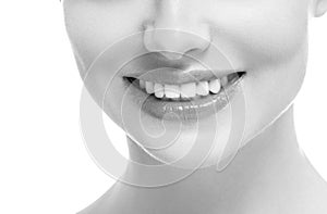 Healthy teeth smile woman beautiful face close up monochrome