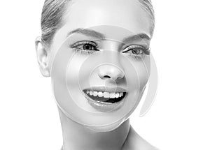 Healthy teeth smile woman beautiful face close up monochrome