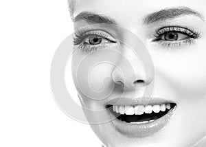 Healthy teeth smile woman beautiful face close up monochrome