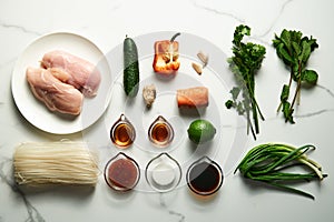 Healthy Thai chicken noodle salad ingredients list. Aisan cuisine. Rice noodles with chicken and vegetables sauce based