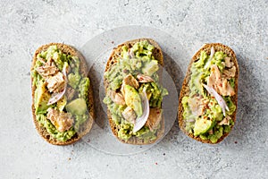 Healthy toast with avocado and tuna