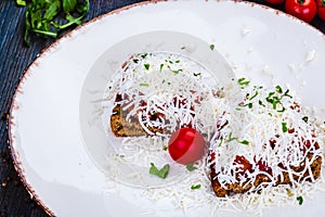 Healthy toasts with rye bread with tomato, cheese on white plate