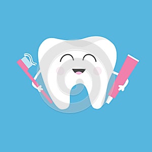 Healthy tooth holding toothpaste and toothbrush. Cute funny cartoon smiling character.