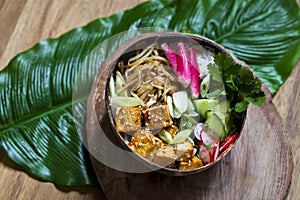 Healthy vegan bowl with tofu and vegetables