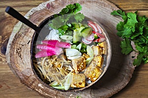 Healthy vegan bowl with tofu and vegetables