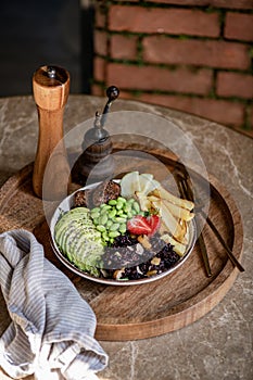 Healthy vegan Falafel, edamame, avocado and brown rice bowl