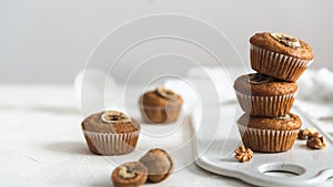 Healthy vegan oat muffins, apple and banana cakes on a wooden background. Copy space, Bakery concept