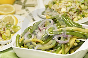 Healthy vegan salad of fresh green beans and onion