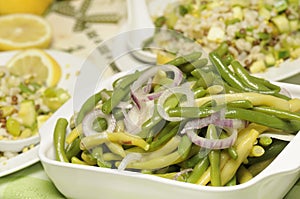 Healthy vegan salad of fresh green beans and onion photo