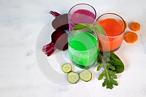 Healthy vegetable smoothie and juice on light backround