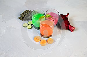 Healthy vegetable smoothie and juice on light backround