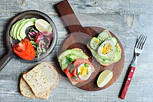 healthy vegetarian breakfast, avocado toast with cucumber, eggs