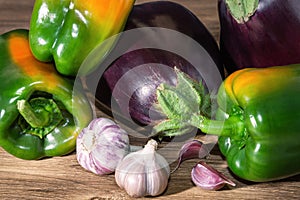 Healthy vegetarian food concept, food background with fresh vegetables, ingredients for cooking a balanced meal eggplant pepper