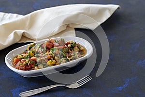 Healthy vegetarian food on dark background. Empty space for text. Copy space