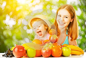 Healthy vegetarian food. happy family mother and baby daughter w