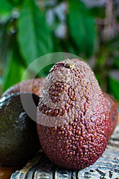 Healthy vegetarian food â€“ green ripe avocado, new harvest, wit