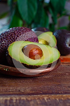 Healthy vegetarian food â€“ green ripe avocado, new harvest, wit