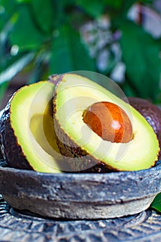 Healthy vegetarian food â€“ green ripe avocado, new harvest, wit
