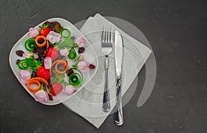 Healthy vegetarian summer salad with edible flowers