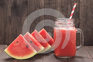 Healthy watermelon smoothie on a wood table