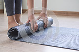 Healthy and wellness lifestyles concept. Woman prepare yoga mat to meditation