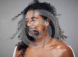 Healthy, wet hair and skincare beauty of a black woman with cosmetics product mockup to hydrate, nourish and moisturize