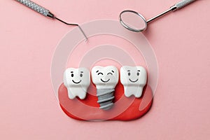 Healthy white teeth and implants are smiling on pink background and dentist tools mirror, hook.