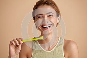 Healthy White Teeth. Portrait Of Happy Smiling Woman With Fresh Perfect Smile